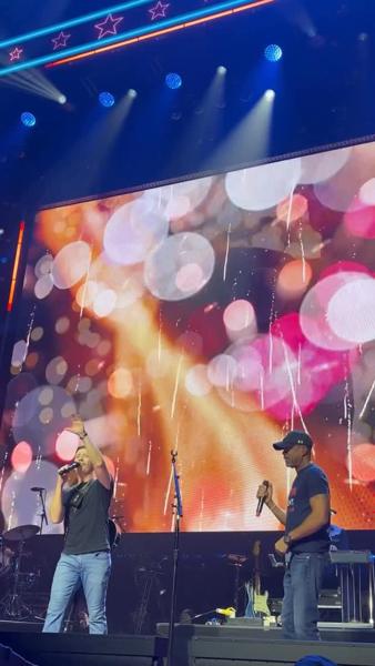 @scottymccreery and surprise guest @dariusrucker performing Bottle Rockets, spec